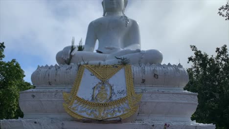 big sitting white buddha statue in thailand