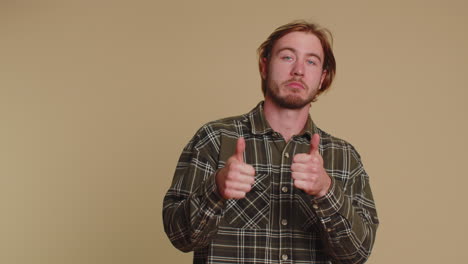 Tourist-stylish-man-in-shirt-showing-thumbs-up-and-nodding-in-approval,-successful-good-work