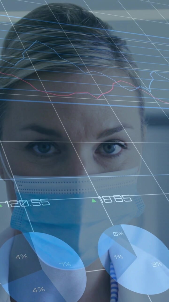 Vertical video: Dr shifting gaze as HUD charts overlaying face, tugging mask, analyzing health data