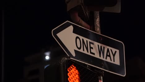 one way sign on traffic pole