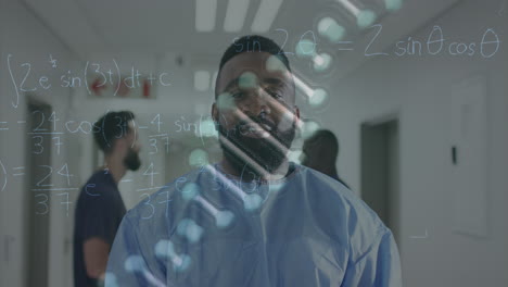 animation of dna strand and maths formulae over smiling african american male doctor in hospital