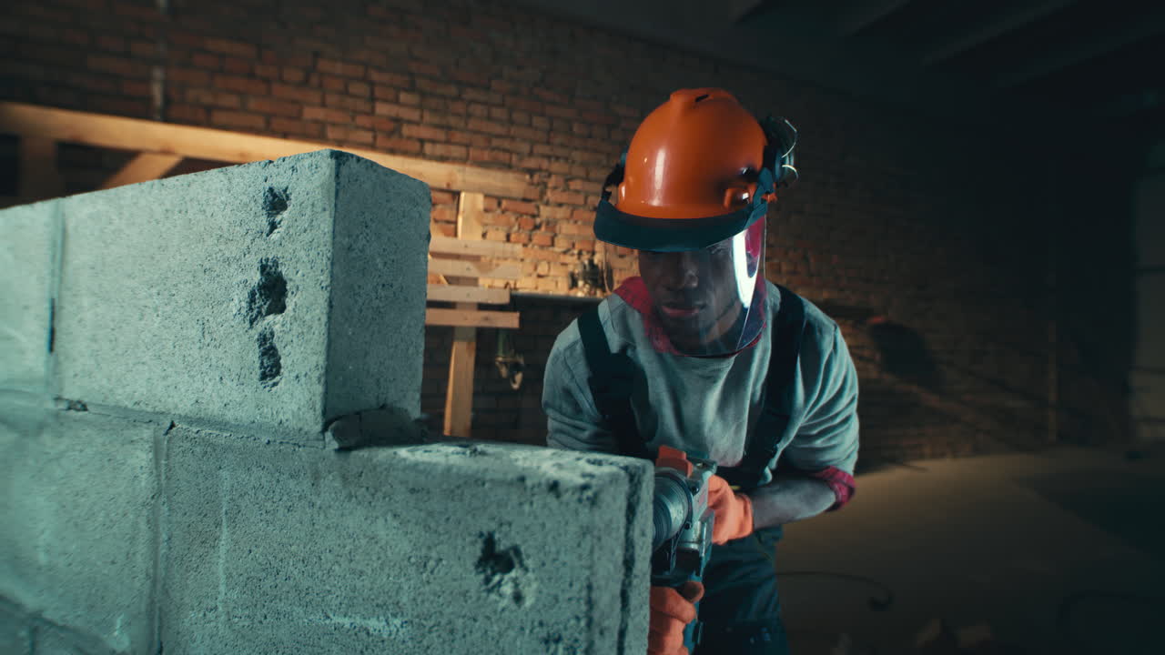 Construction worker repairing a wall