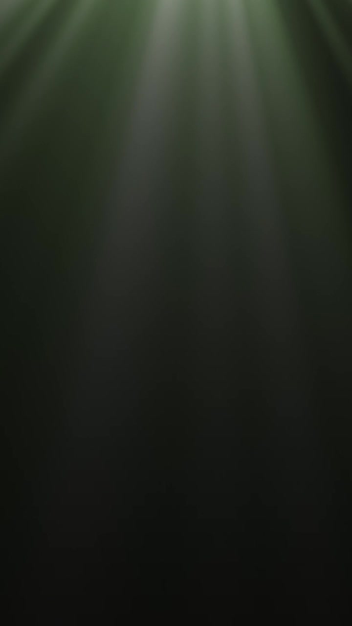 Moving Volumetric Light Rays on Dark Background