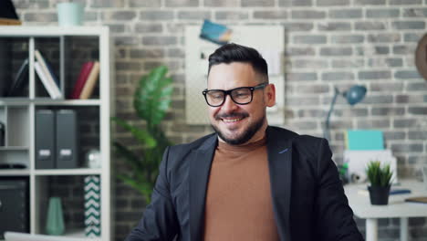 businessman during video call and relaxed
