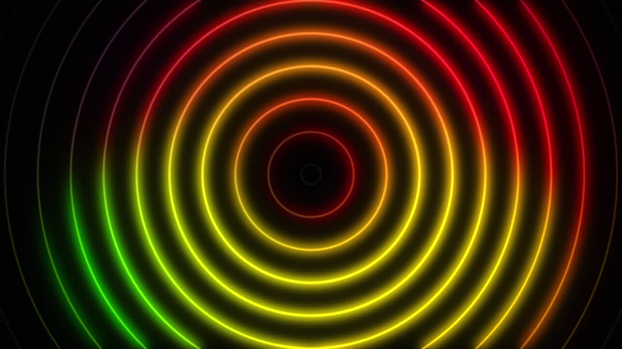 Animazione astratta in loop continuo di un cerchio concentrico con gradiente neon a tre colori su sfondo nero.