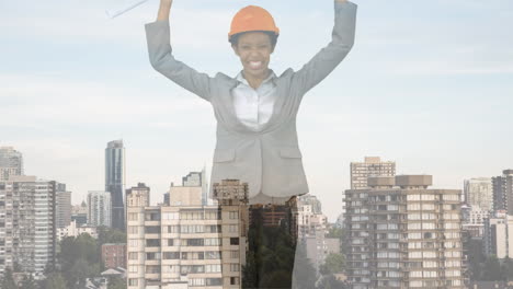 animation of cityscape over african american businesswoman celebrating