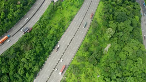 Flyby-drone-over-three-parallel-roads-passing-through-the-Jungles-of-the-Western-Ghats-of-India