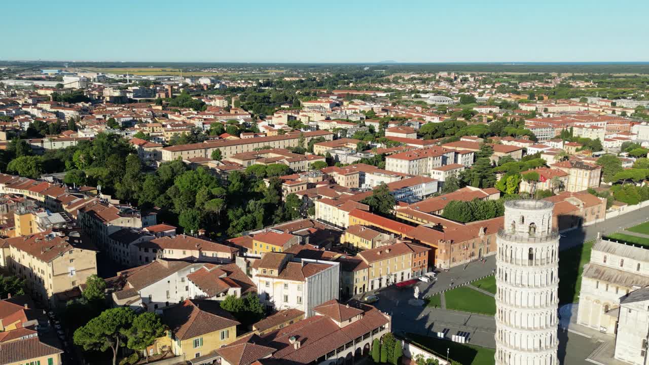 Aerial sunrise view of Pisa, town homes from drone