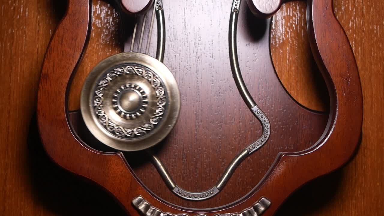 Close up of a pendulum clock