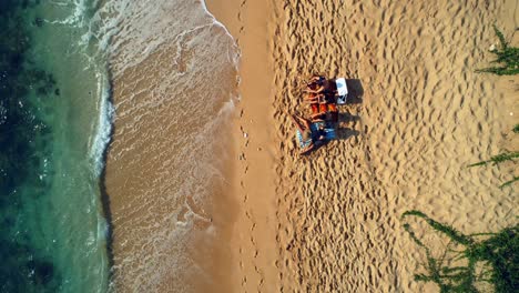 tourists sitting together at beach 4k