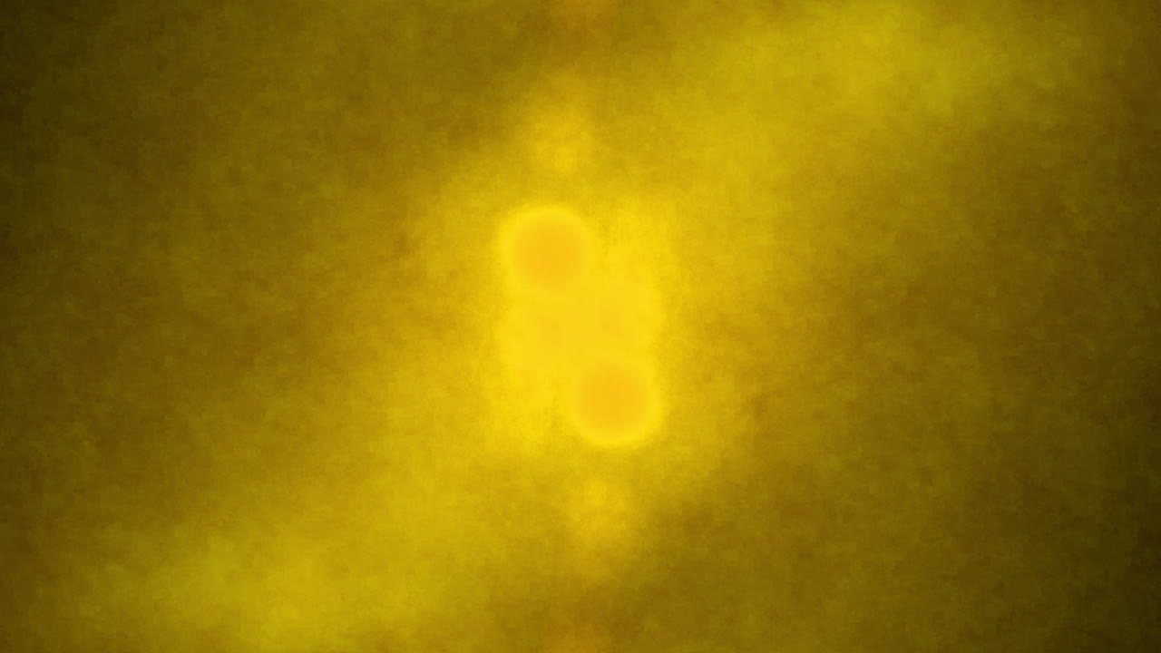 Inchiostro Acquerello Arancione che si Diffonde su Sfondo Bianco