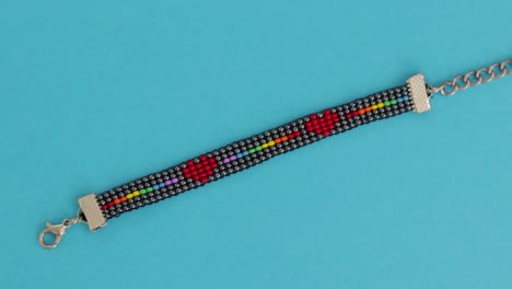 lgbt bead pattern bracelet in blue background