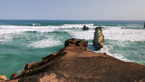 waves crash against a rocky coast