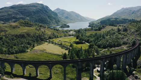 Wide-establishing-shot-of-an-empty-elevated-train-track-in-Scotland's-countryside