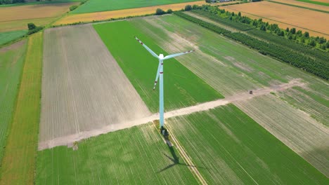 panoramic view of wind farm or wind park, with high wind turbines for generation electricity with copy space