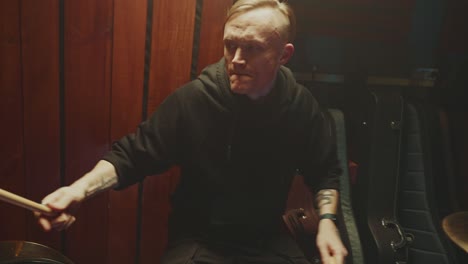 drummer playing drums in a studio