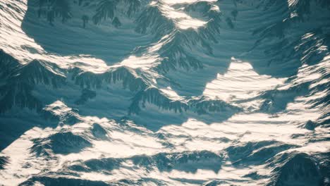 aerial view of the alps mountains in snow