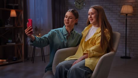 happy mother and daughter taking a selfie