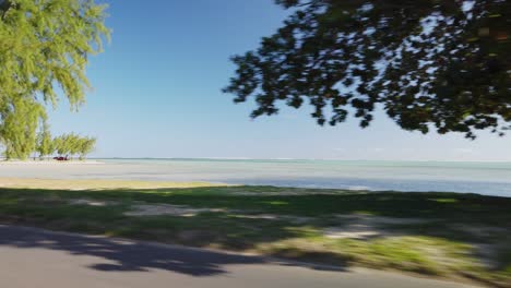 a shot of the sea and shore from the road in maurithius east