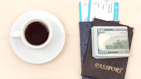 pasaportes, boletos de avión, dinero y café