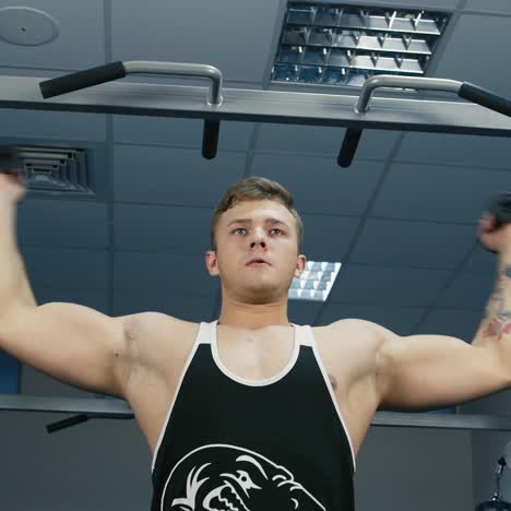 a young man trains in a gym 8