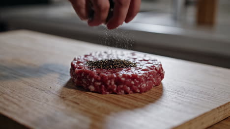 preparing a hamburger patty