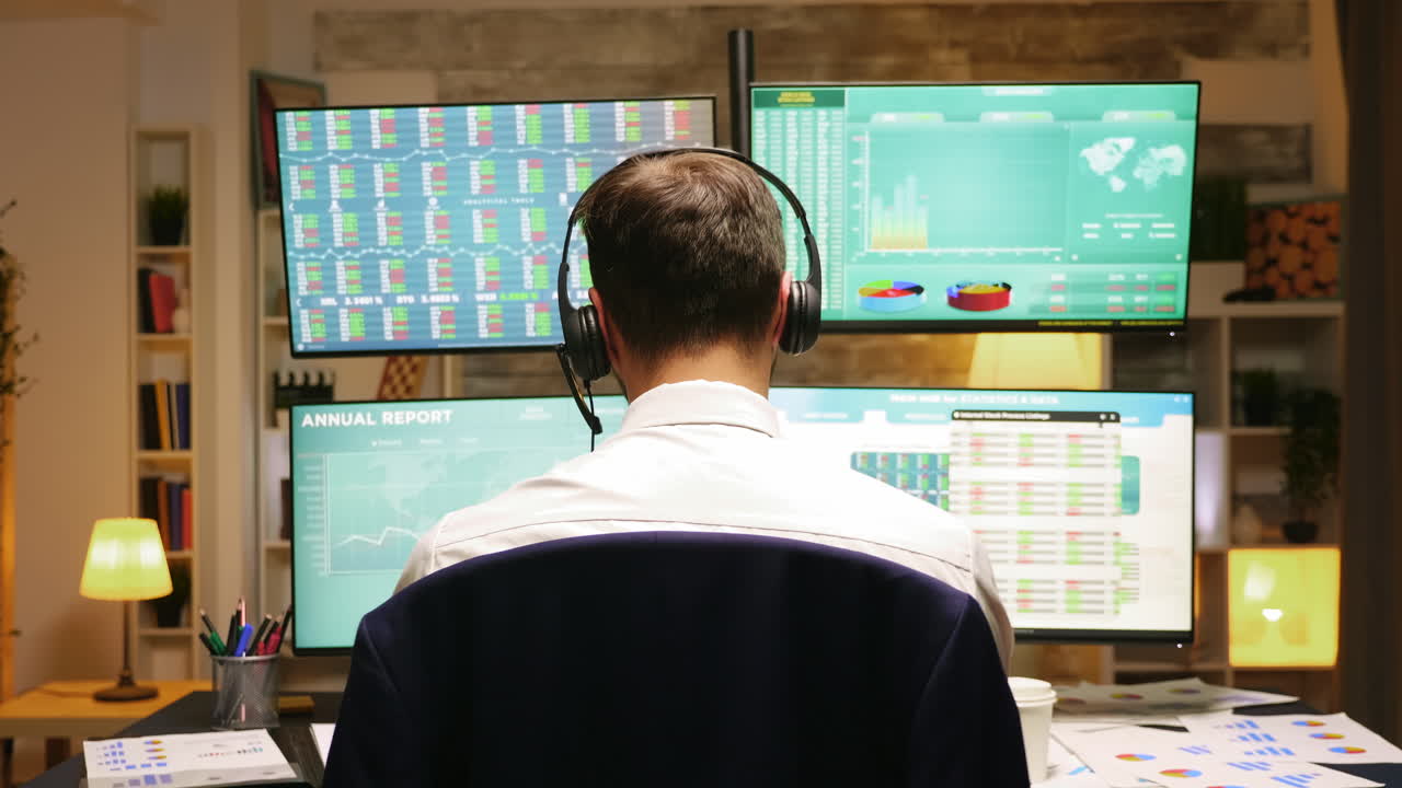 Back view of investor trading stocks online