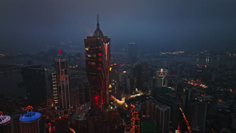 a view of a city at night from the top of a building