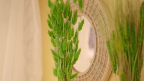 green bunny tail grass bouquet with decorative mirror