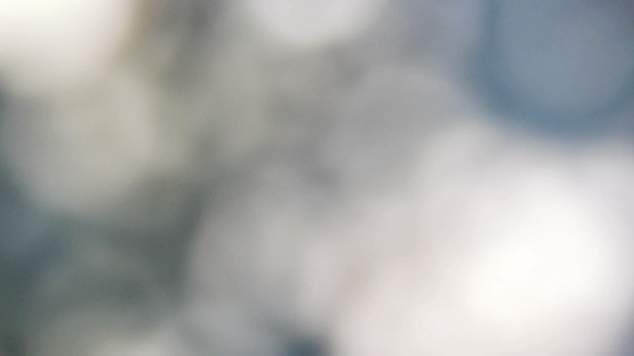 파란색 배경에 움직이는 색 반이는 조명 서클