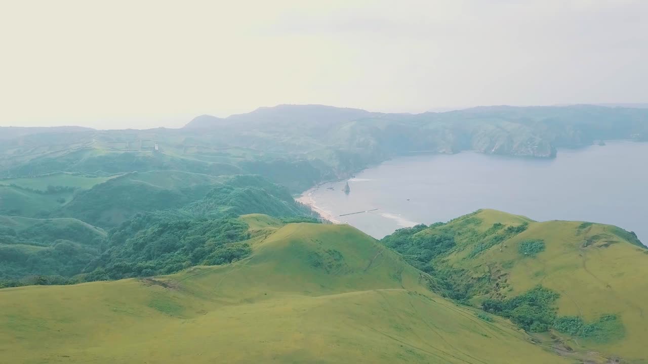 Breathtaking and cinematic aerial drone video of 'marlboro country' like place in Batanes, Philippines.