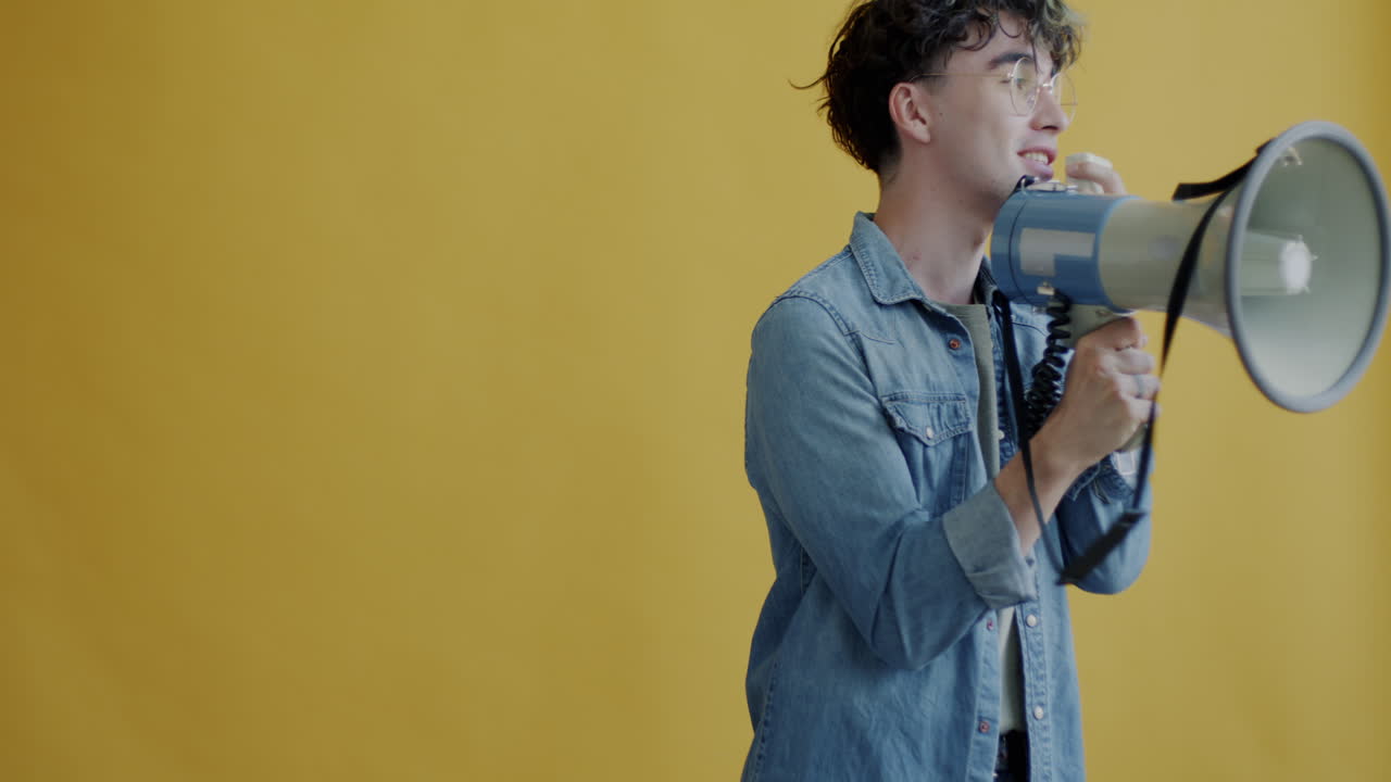 Person Holding Megaphone