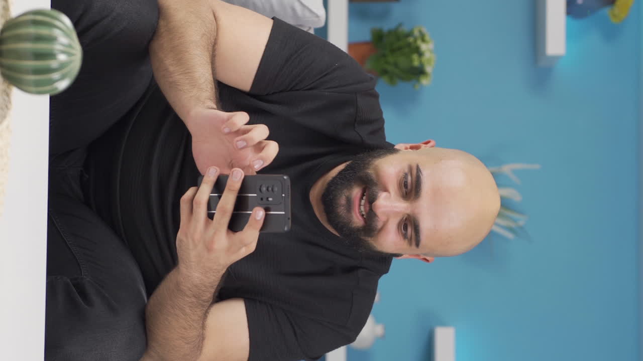 Vertical video of The man who reads the good news.