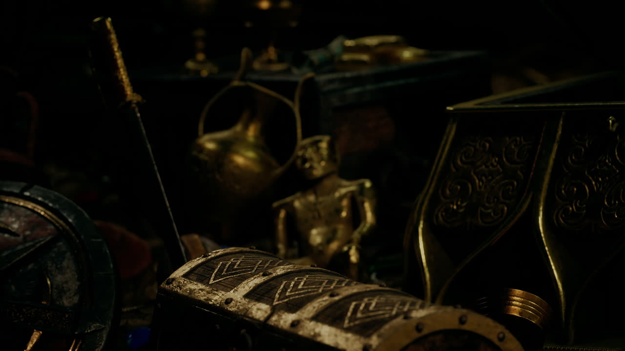 어 ⁇  속에서 보석과 금 동전을