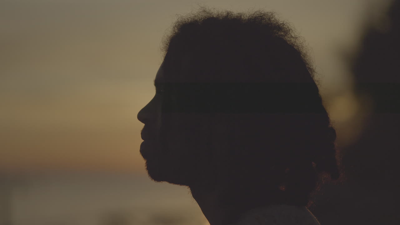 Man in Profile Silhouette at Sunset