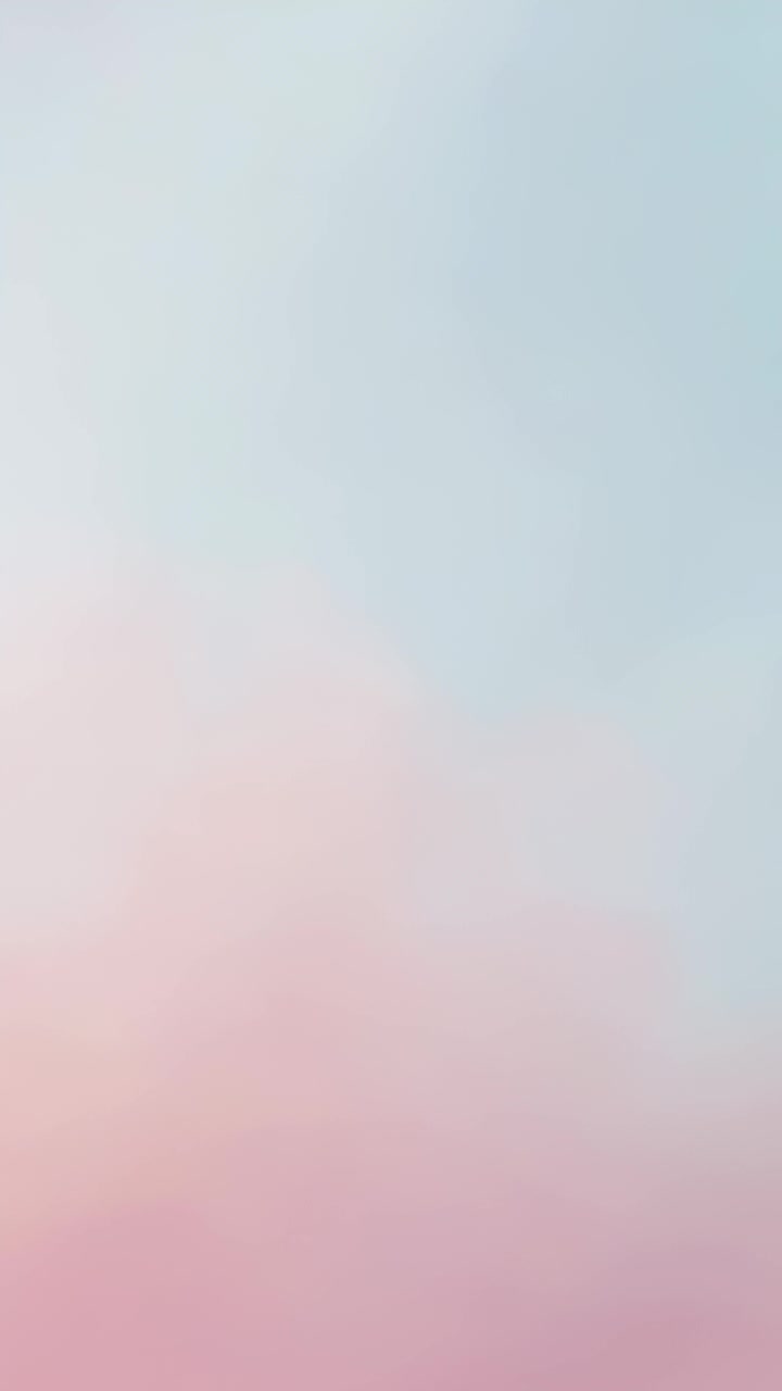 Video verticale: Gradiente pastello dinamico che cambia sullo schermo ogni secondo, sfumando rosa e blu.