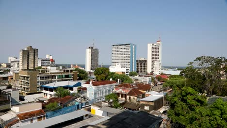 wide angle establishing shot of manaus, brazil with the amazon river along the horizon