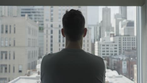 looking out window at chicago cityscape