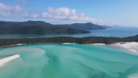 bird's eye view of whitehaven beach and hill inlet - seascape near great barrier reef in whitsunday island, qld, australia