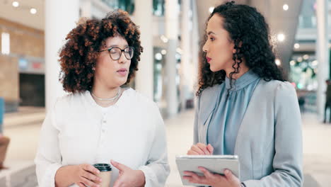 Tablet,-business-women-and-talking-in-office