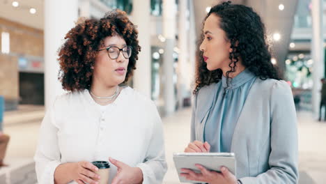 tablet, business women and talking in office