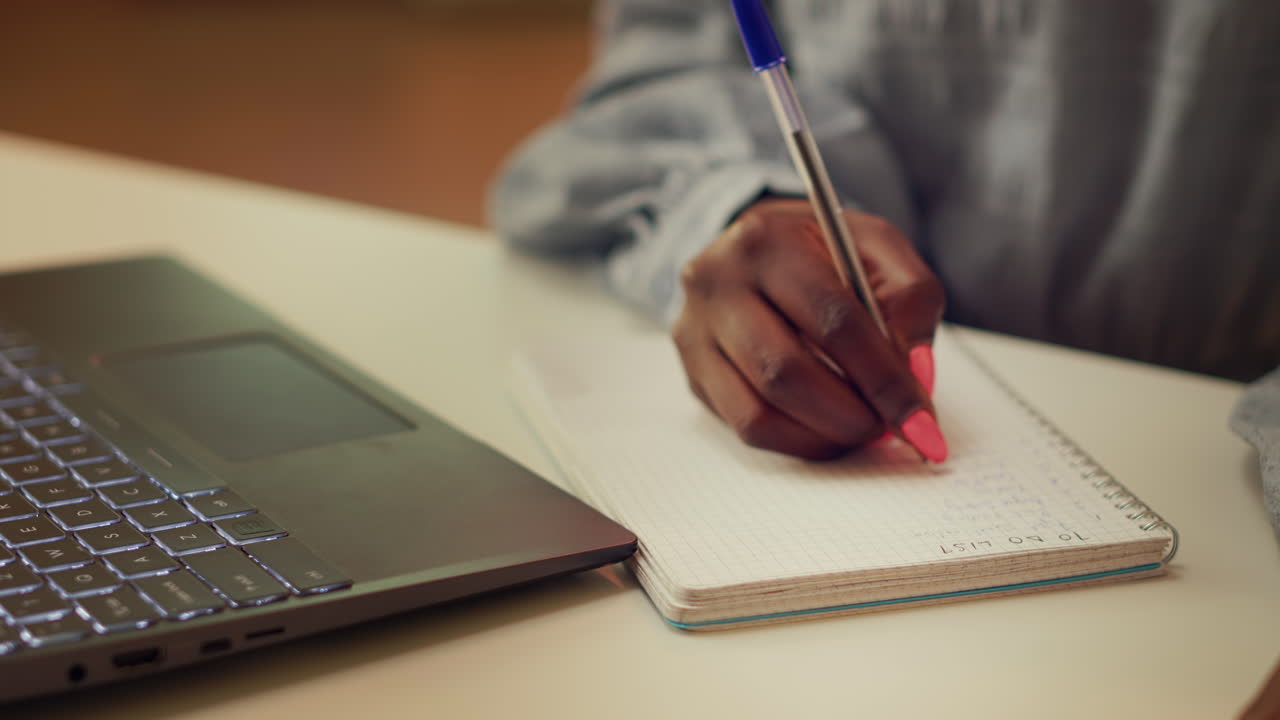 Woman taking handwritten ideas notes