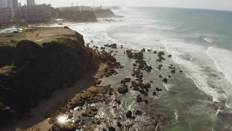 4k-Aerial---Rocky-coastline-with-crashing-waves-pan-up---North-Israel