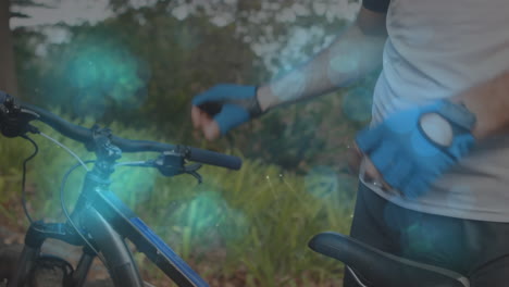 animación de formas que se mueven sobre el hombre caucásico con bicicleta usando guantes