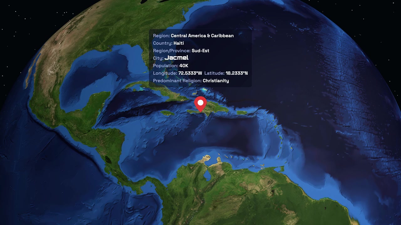 A digital globe rotates and zooms into Jacmel, Haiti, displaying specific regional demographic information