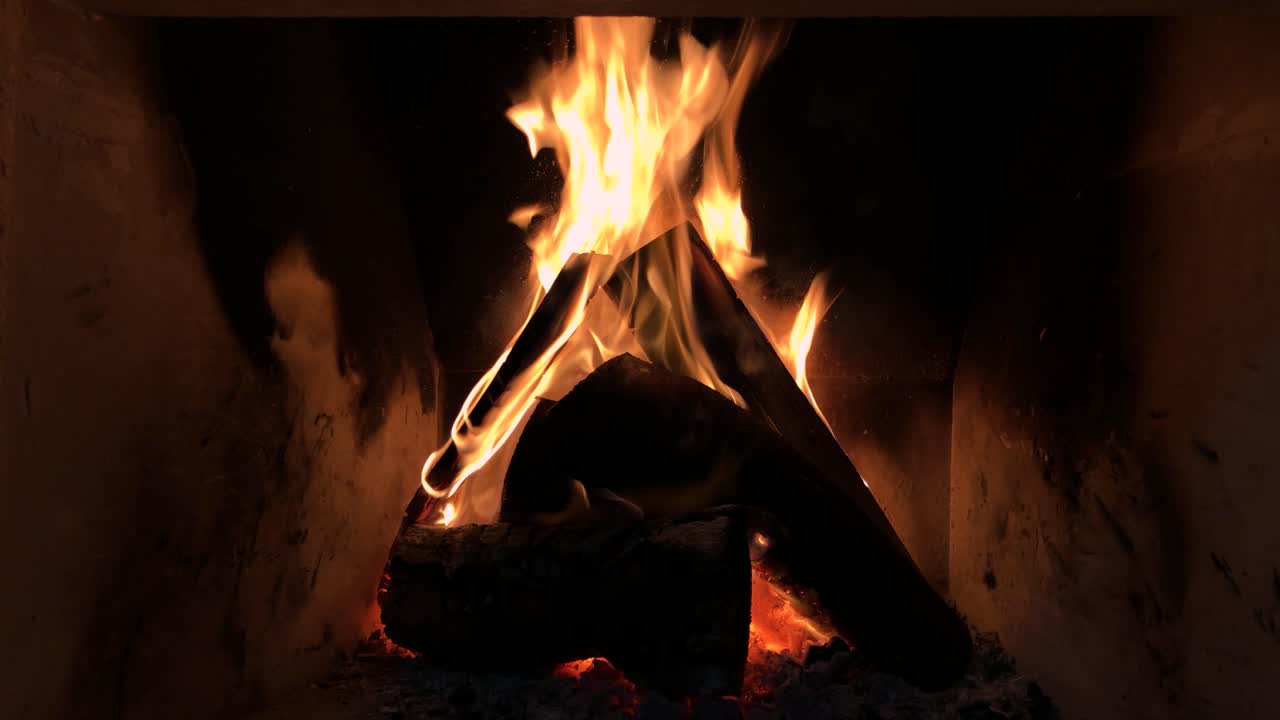 Flame camera footage of wood burning in fireplace