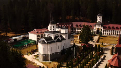 aerial drone shot of the caraiman monastery in romania, predeal