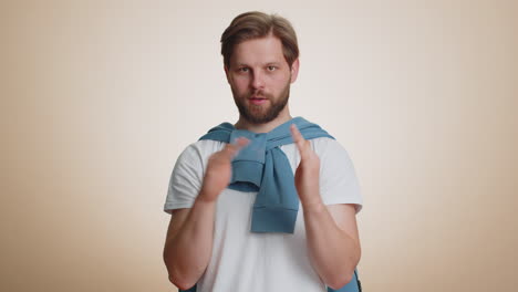 confused displeased surprised caucasian man pointing fingers hisself rejection refusal stop sign