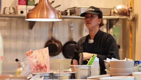 chefs working together in a busy kitchen