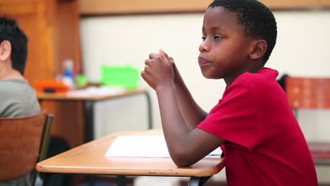 Pupil-sitting-at-his-table